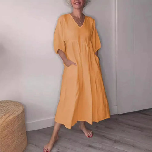 Eeva™ - Loose V-neck midi dress with pockets