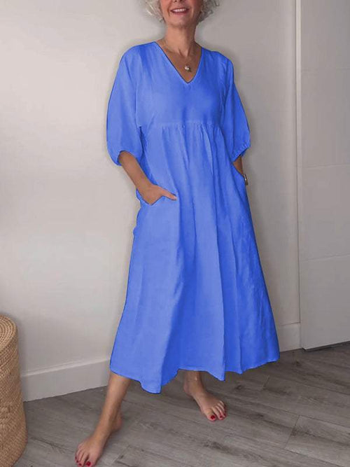 Eeva™ - Loose V-neck midi dress with pockets