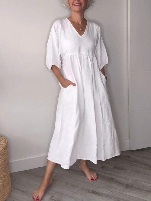 Eeva™ - Loose V-neck midi dress with pockets