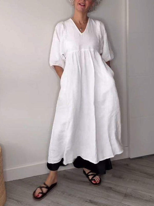 Eeva™ - Loose V-neck midi dress with pockets