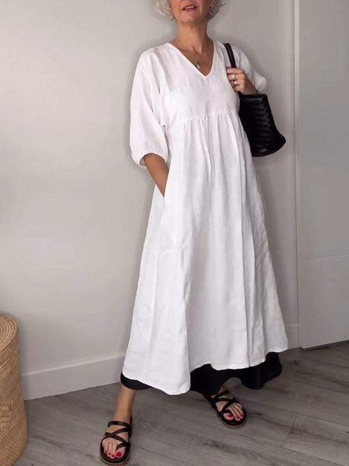 Eeva™ - Loose V-neck midi dress with pockets